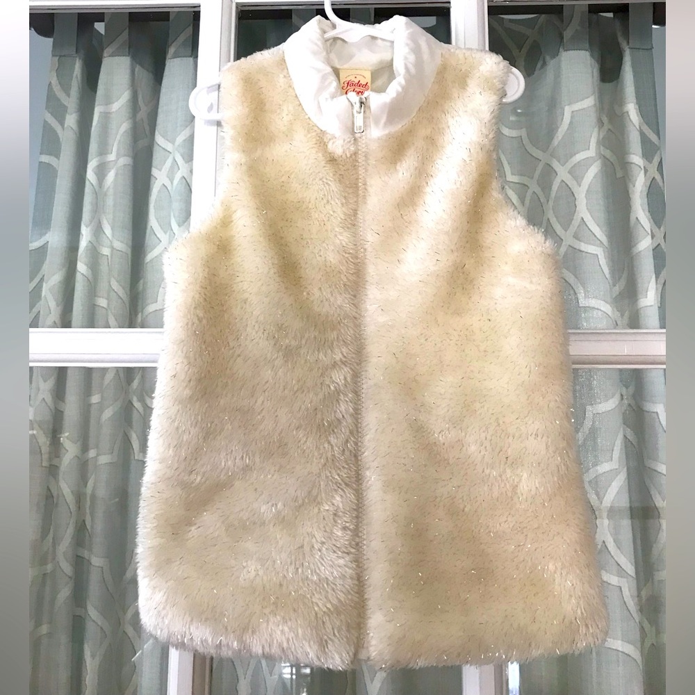 White vest size 6X. Metallic fibers in faux fur sparkly and eye-catching!